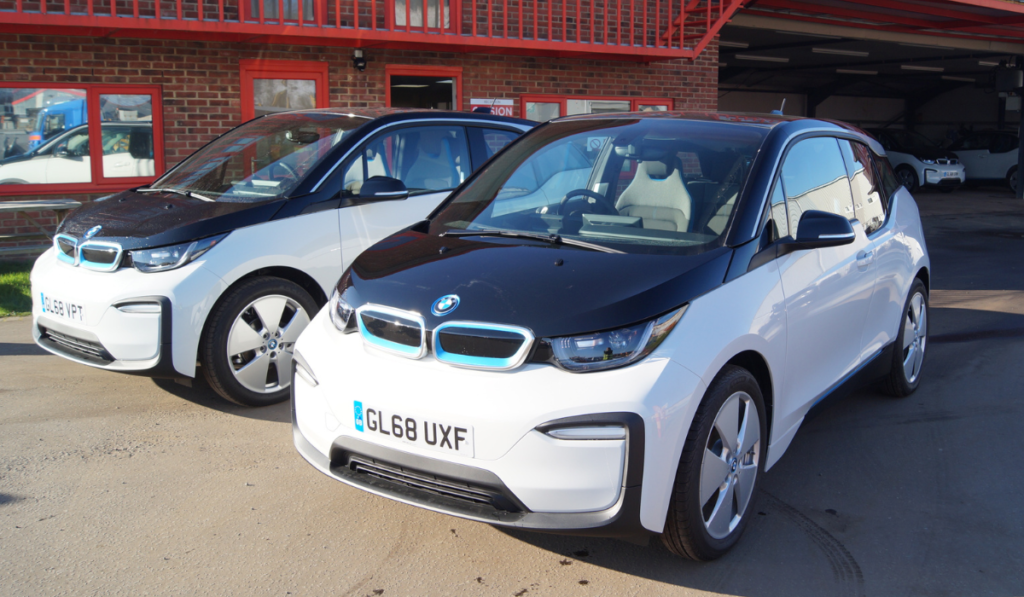 Two BMW i3s side by side