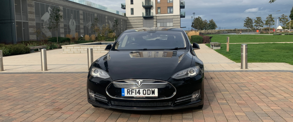 Black Tesla Model S facing forward